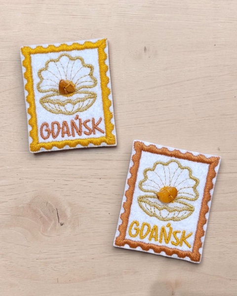 Magnes Gdańsk z bursztynem